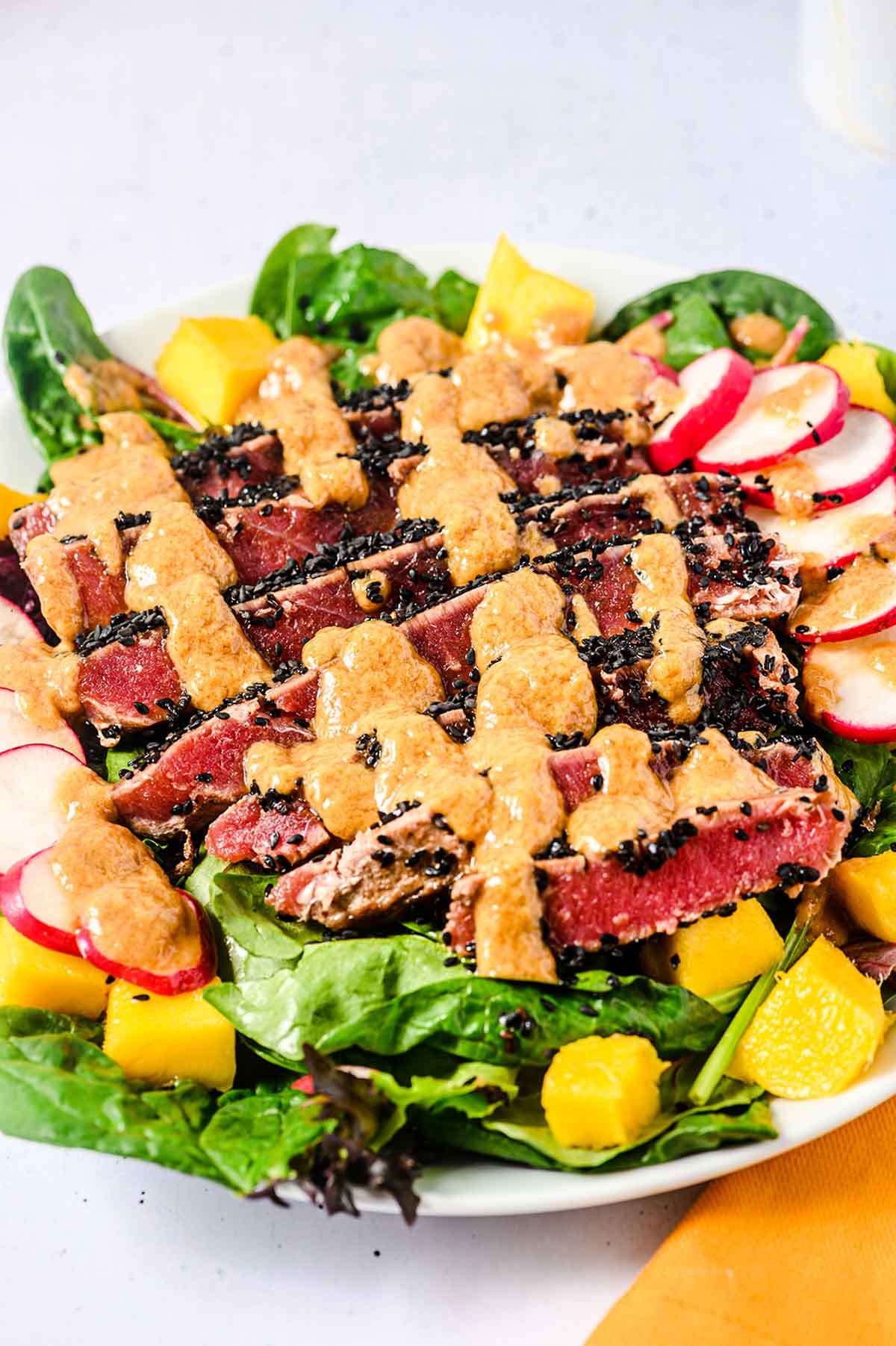 Sliced ahi tuna salad.