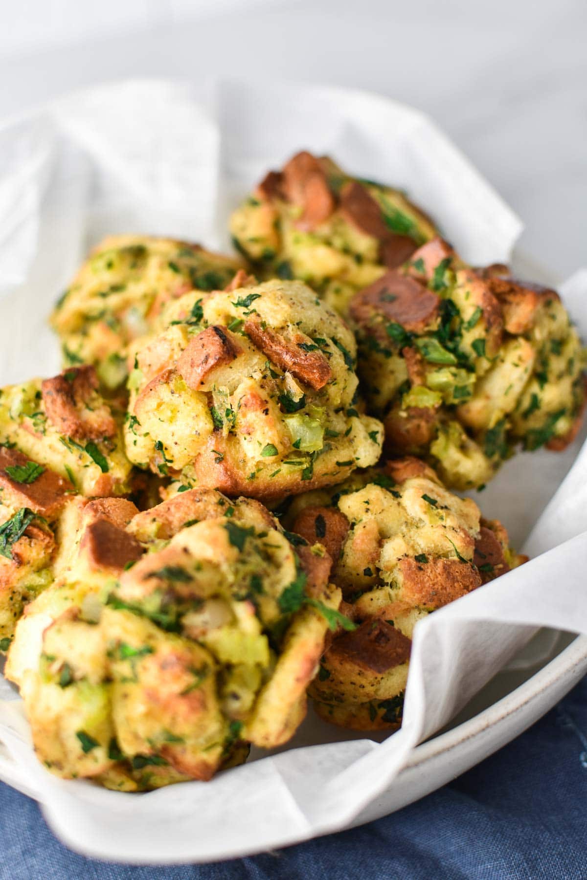 Stuffing balls in a bowl with parchment. 