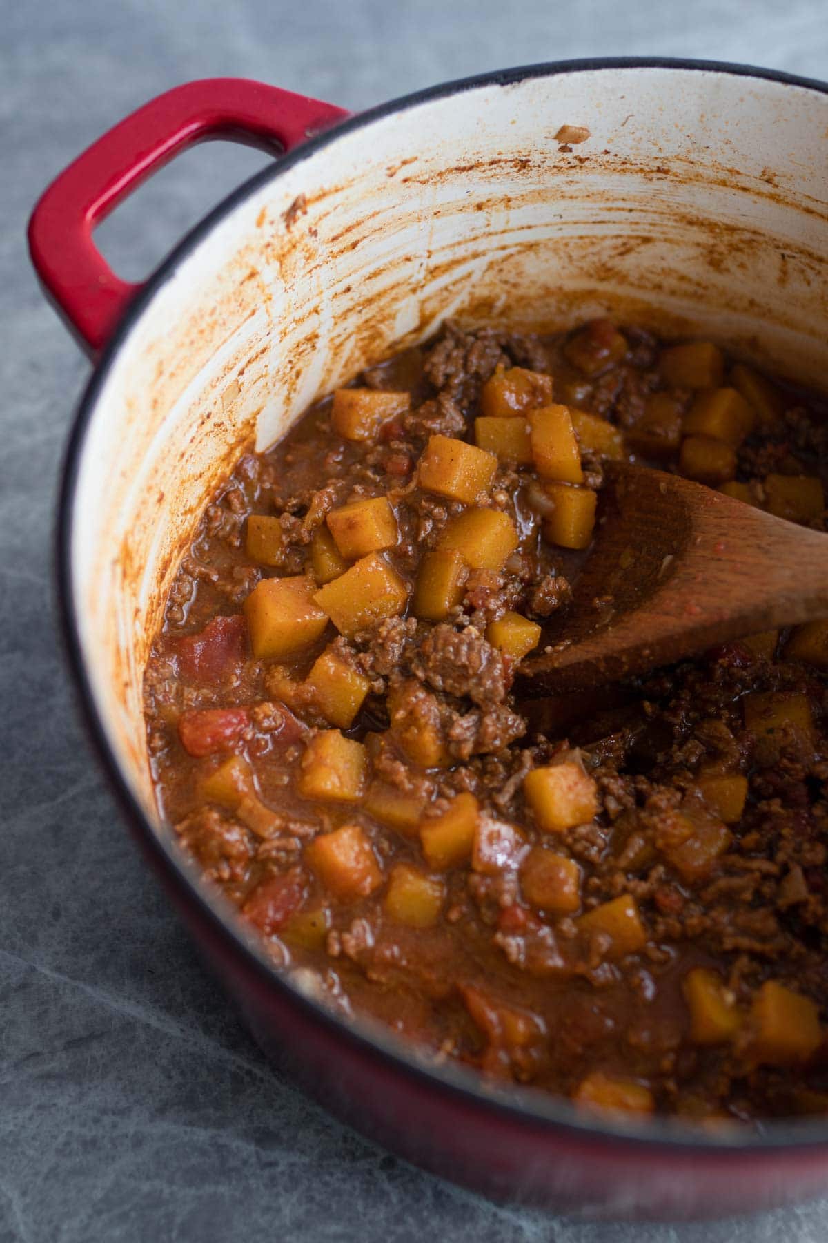 A pot of chili without beans and butternut squash.