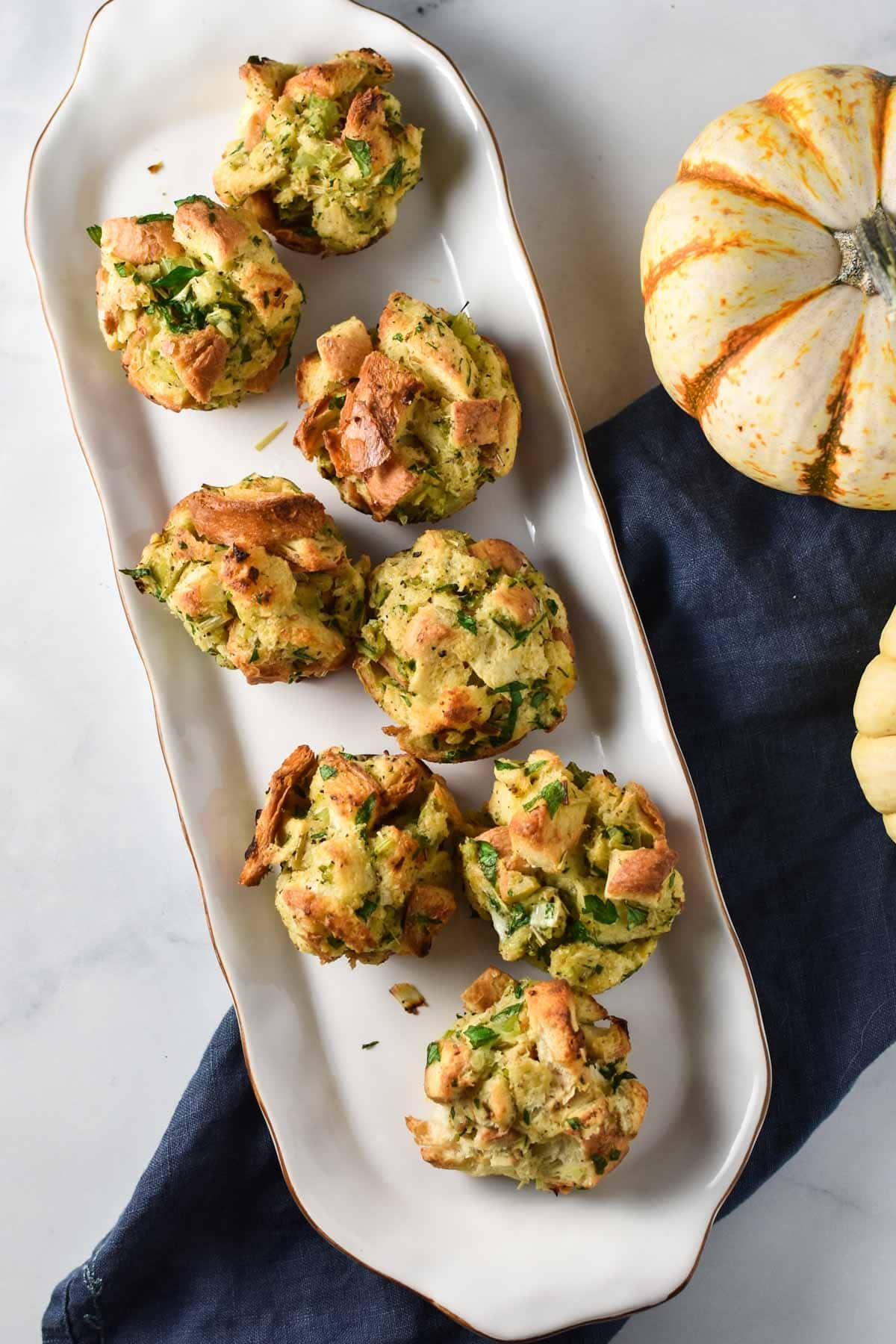 Balls of stuffing on a serving plate.