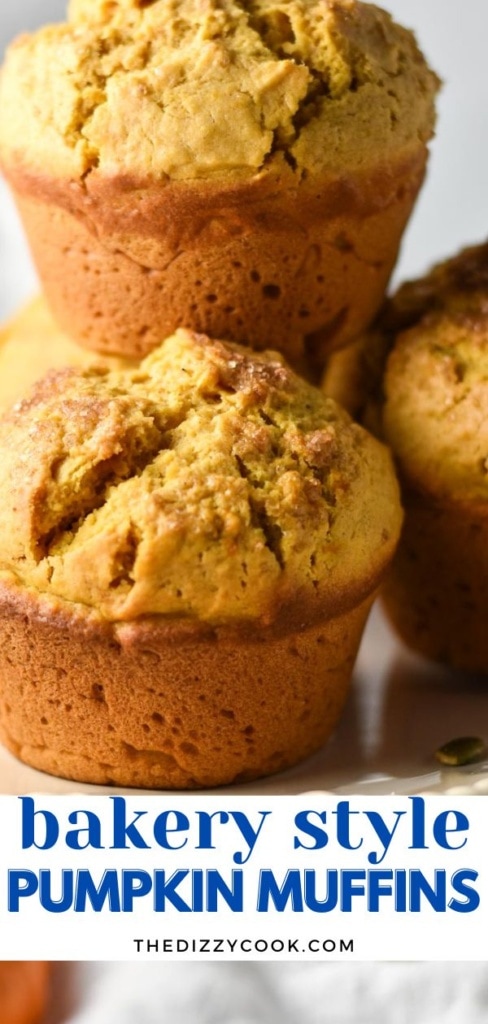 Bakery style pumpkin muffins stacked.