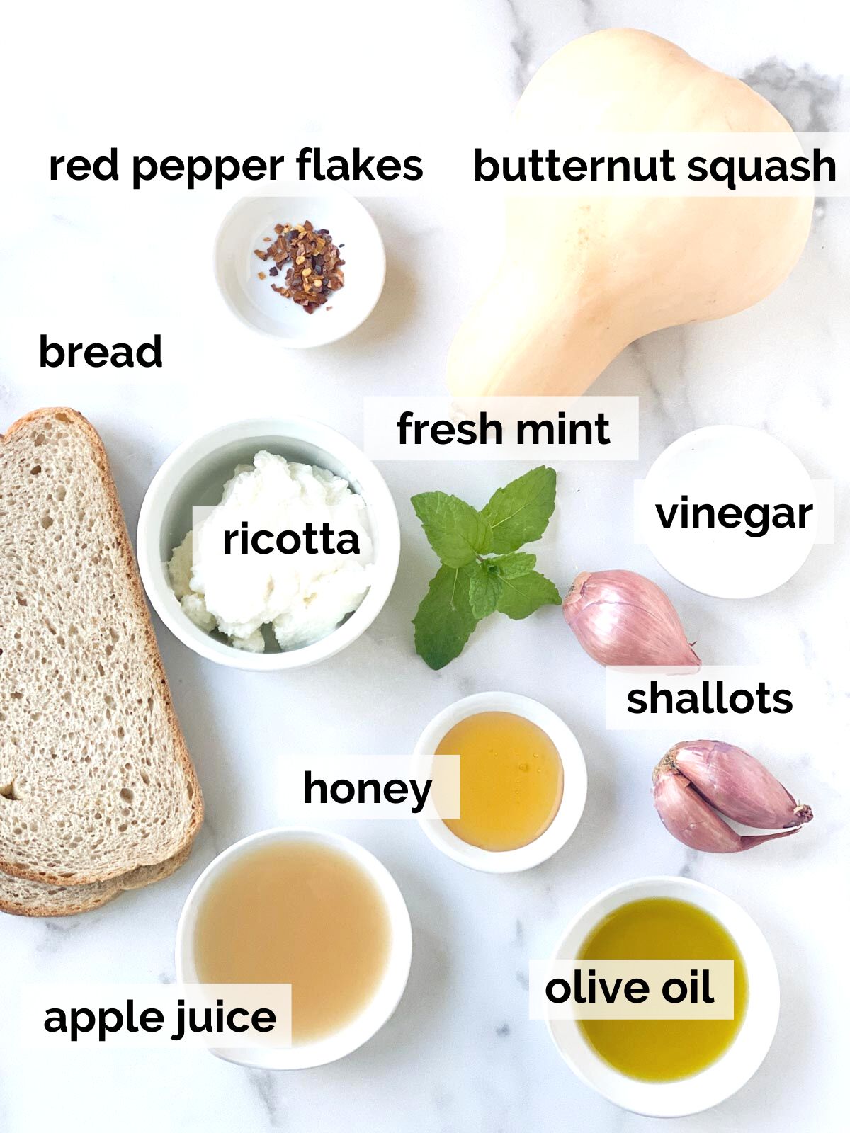 Ingredients for crostini on a table.