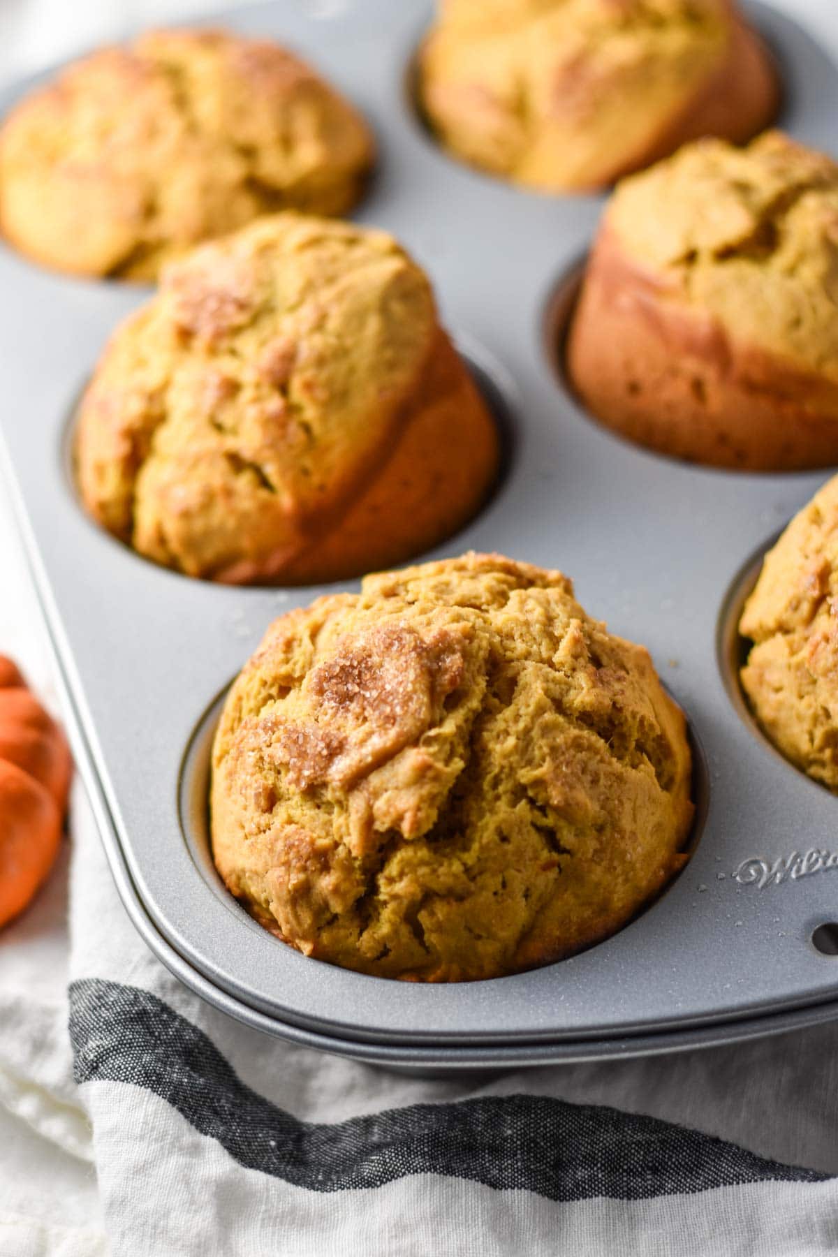 Jumbo muffins just baked in a pan.