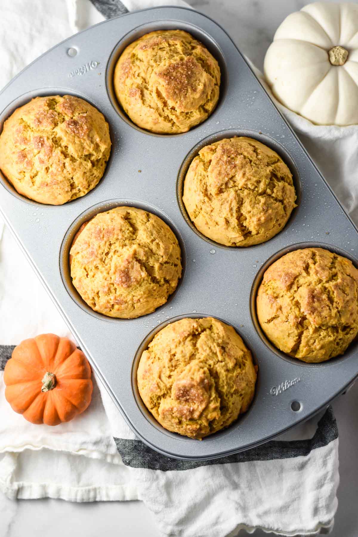 Pumpkin muffins in a wilton jumbo muffin pan.