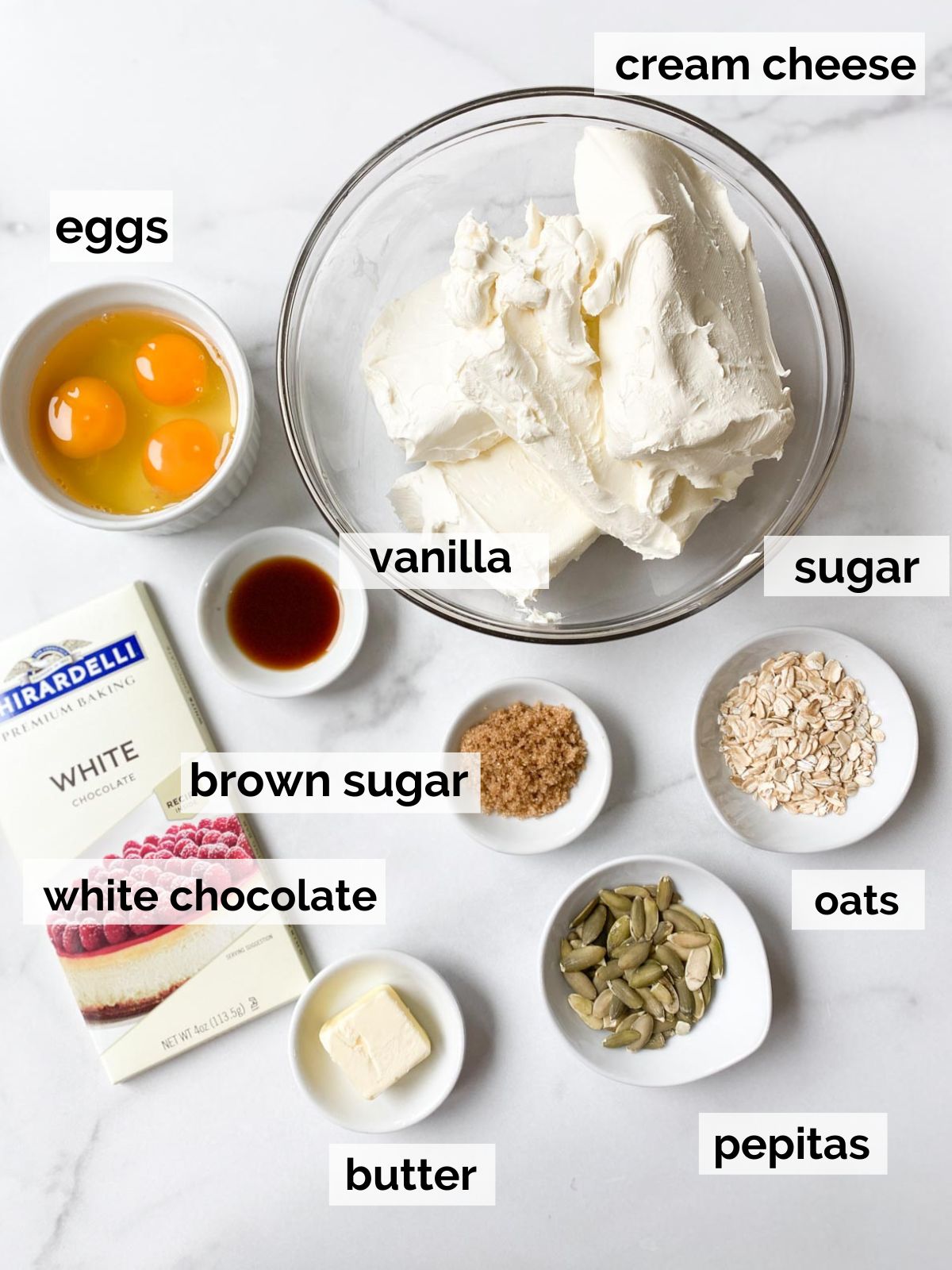Ingredients for white chocolate cheesecake.
