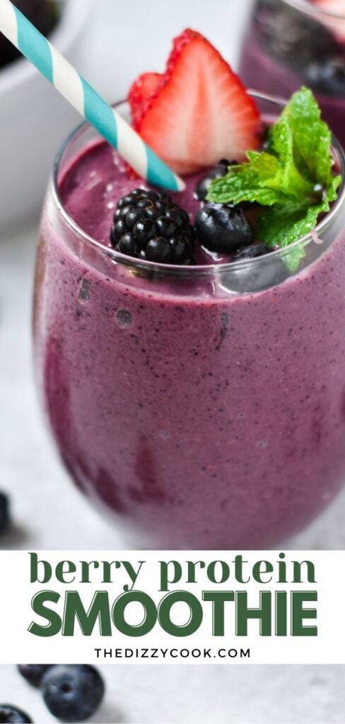 A mixed berry smoothie with a straw.