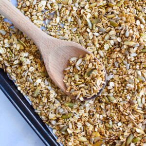 Granola with buckwheat and oats on a baking sheet.