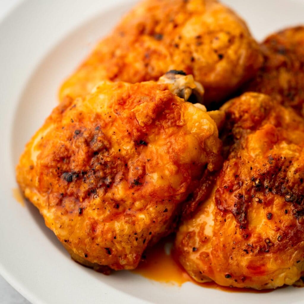 Buffalo Chicken Thighs - The Dizzy Cook
