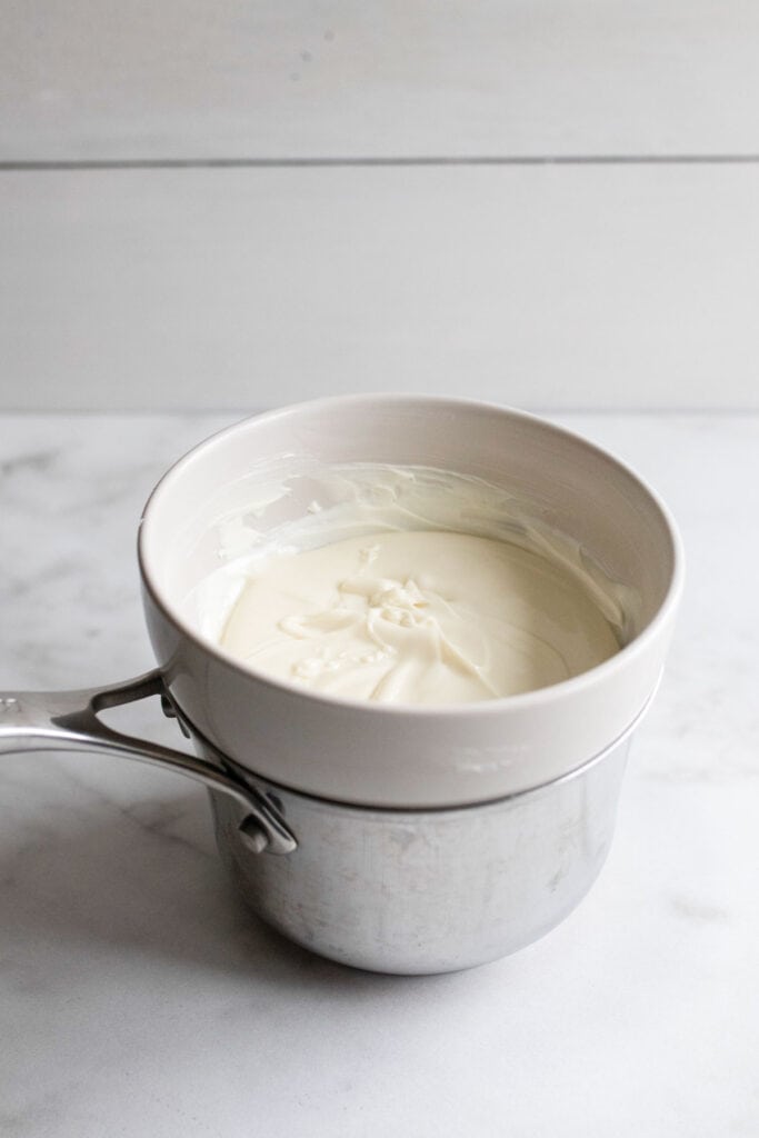 Melted white chocolate in a double boiler.