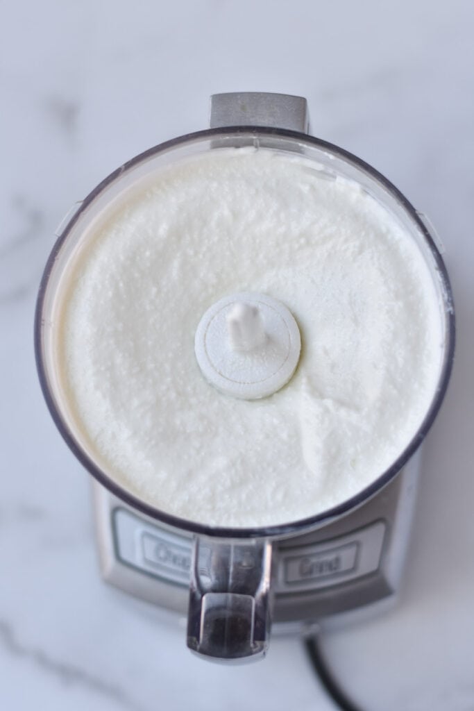 Cottage cheese in a food processor after whipping.