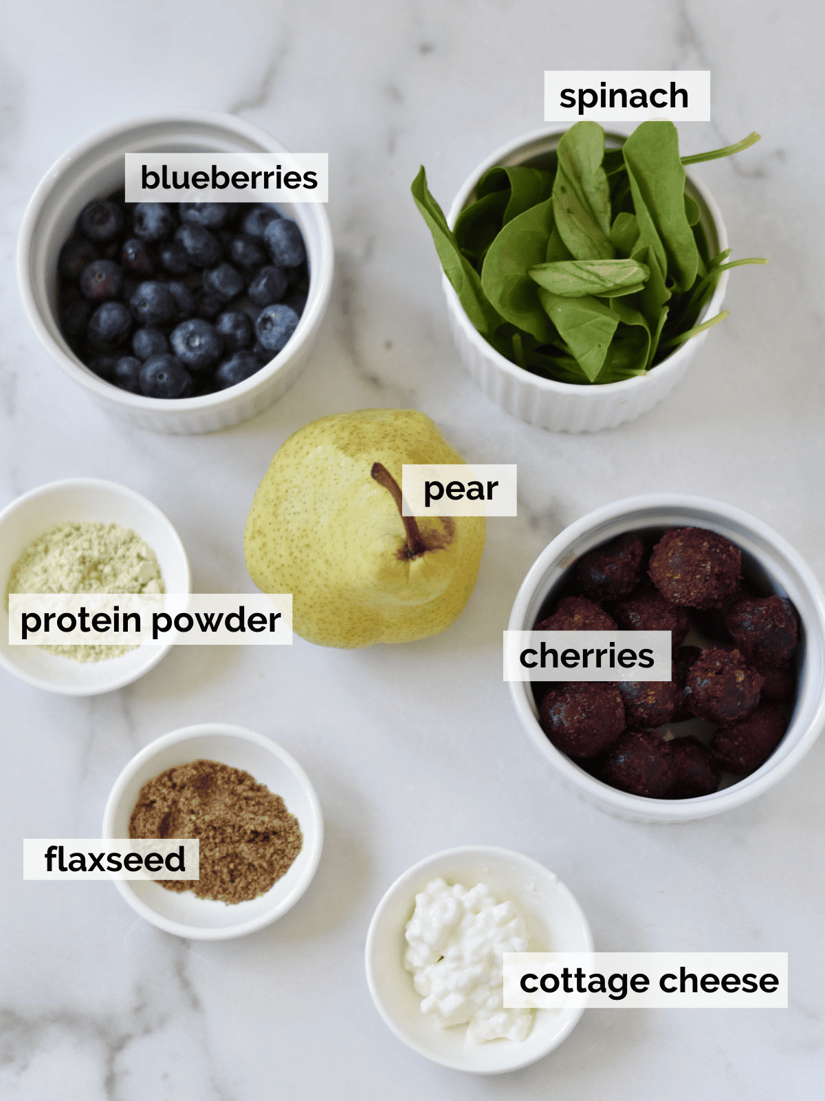 Ingredients for a smoothie for gut health on a marble background.
