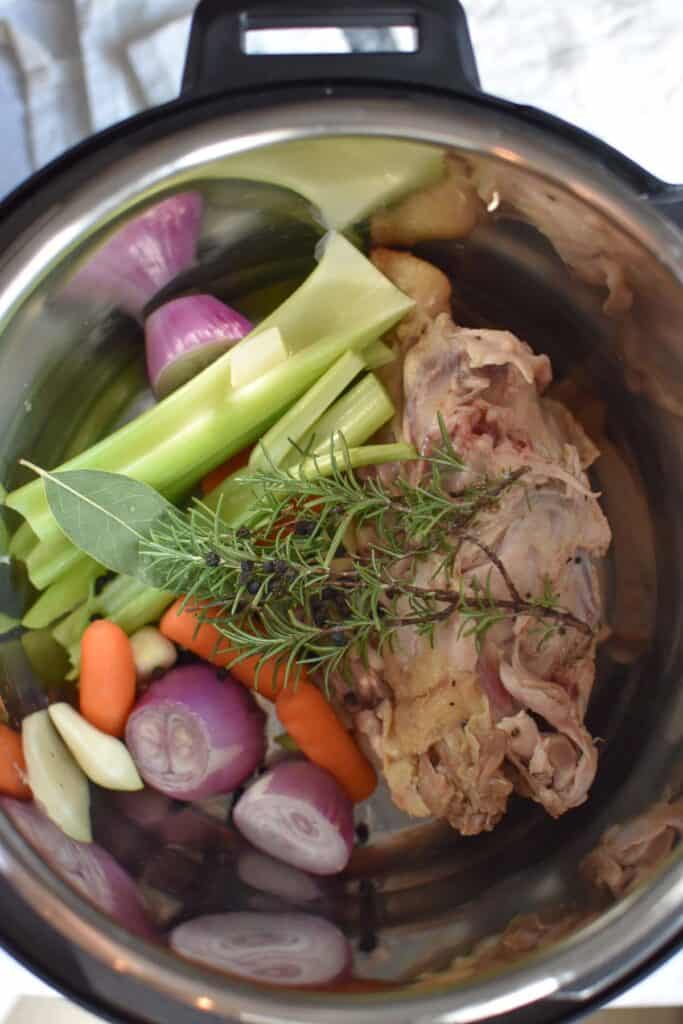 Ingredients for chicken broth in an instant pot.