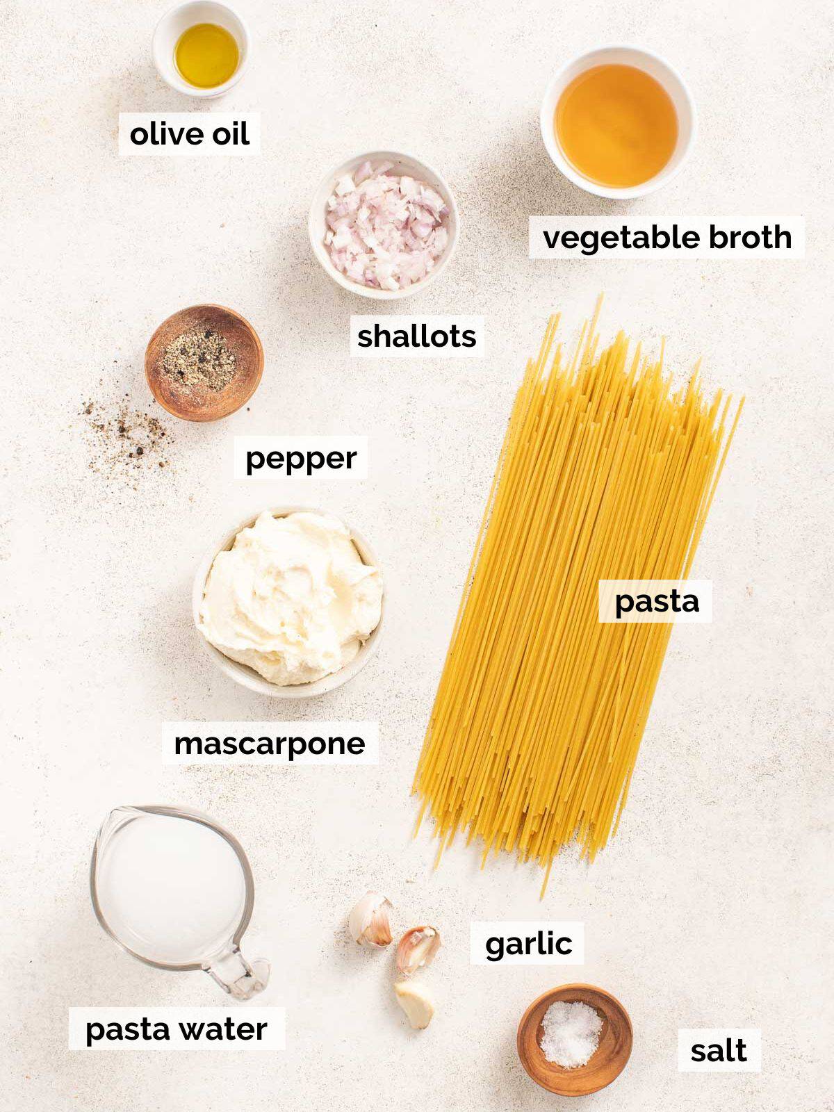 Ingredients for mascarpone pasta on a white background. 