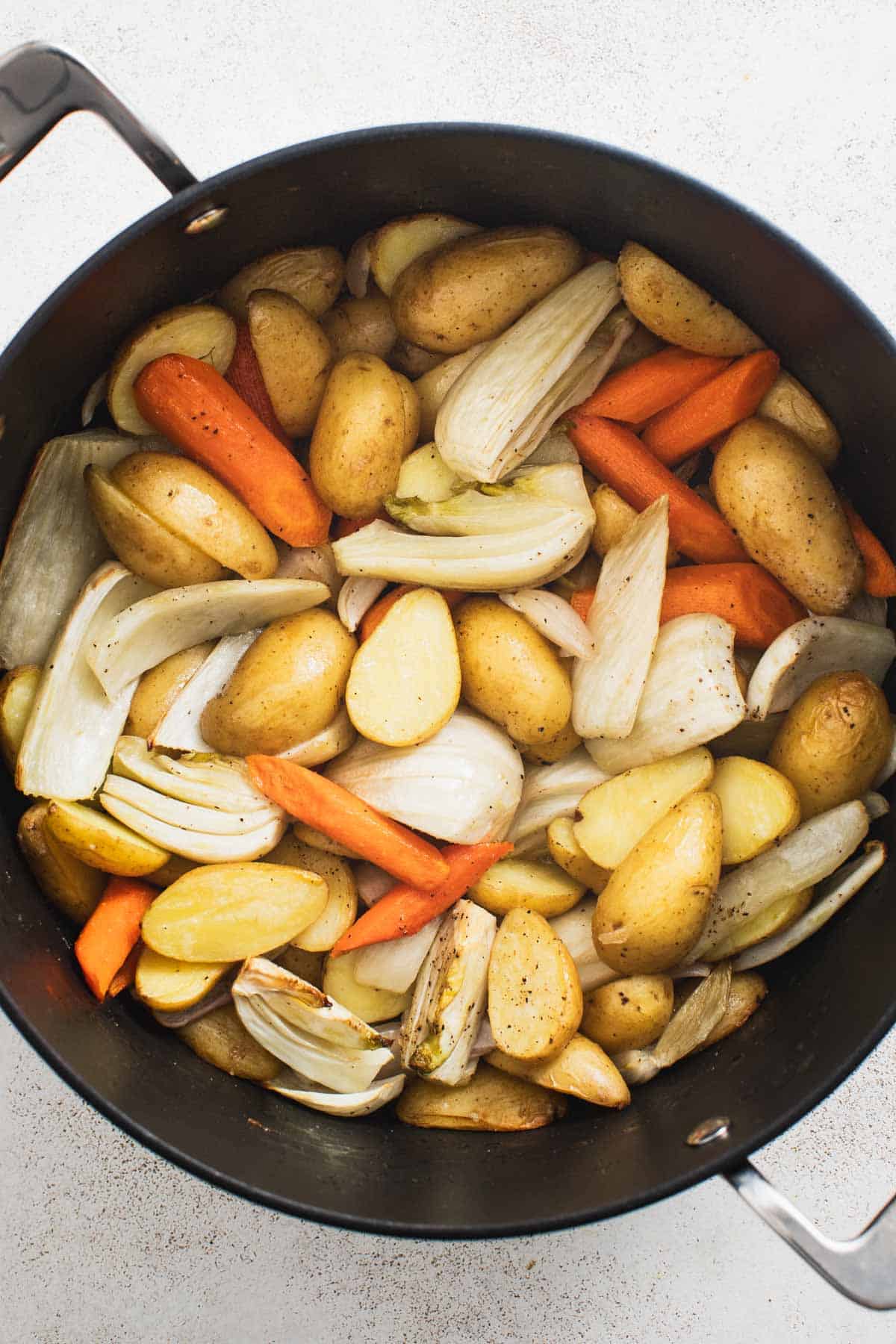 Saut&eacute;ing vegetables in a dutch oven pan. 