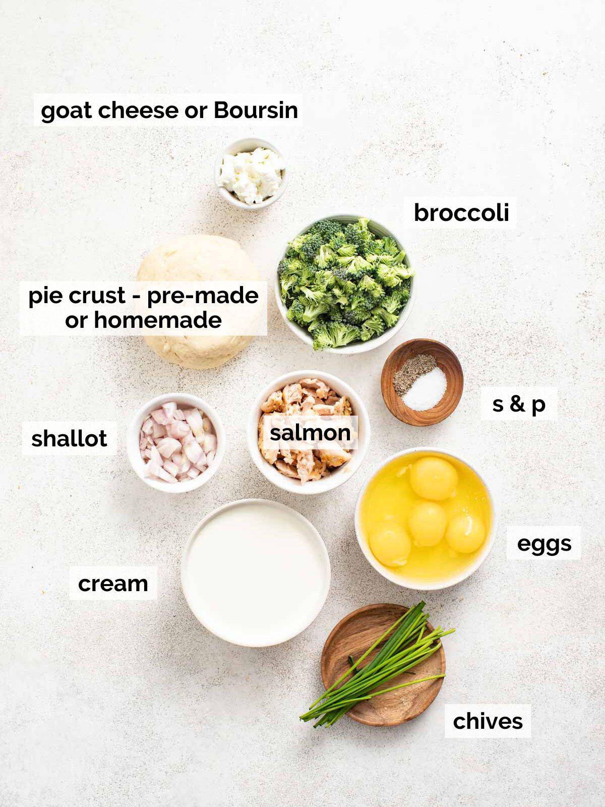 Ingredients for salmon quiche on a white background.