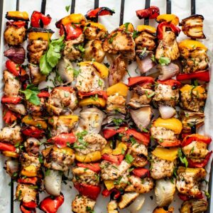 Baked kabobs on a baking sheet.