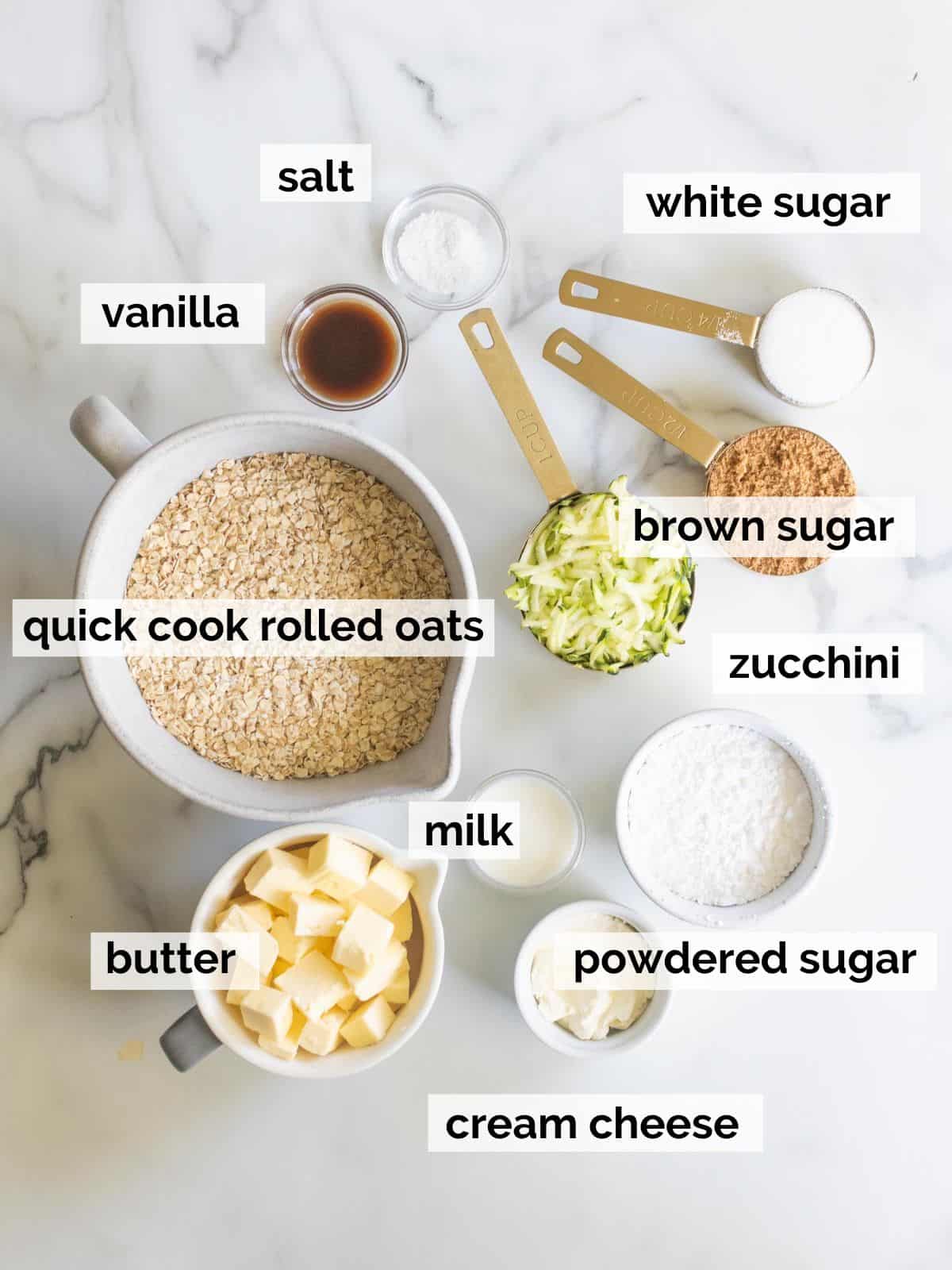 Ingredients for zucchini bars on a white background.