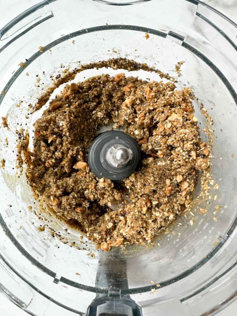 All the dough for energy balls mixed together in a food processor.