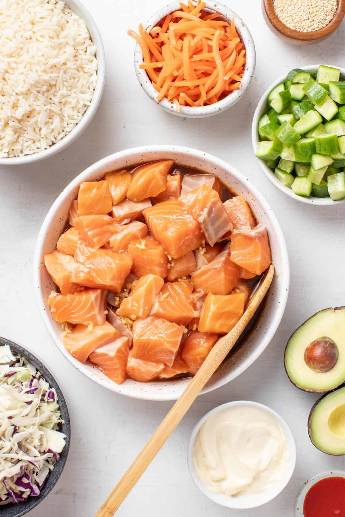 Salmon being marinated in a homemade teriyaki sauce.