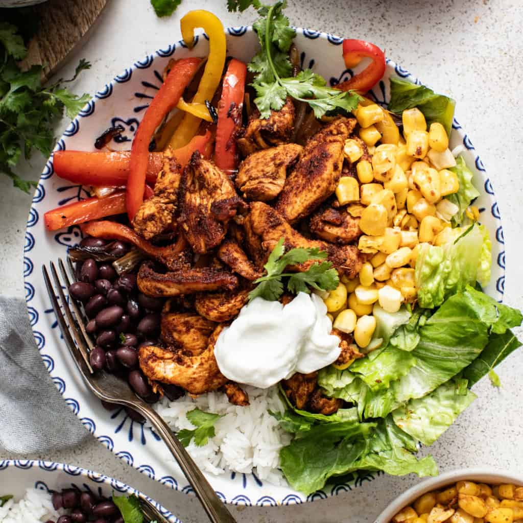 Easy Chicken Fajita Bowls - The Dizzy Cook