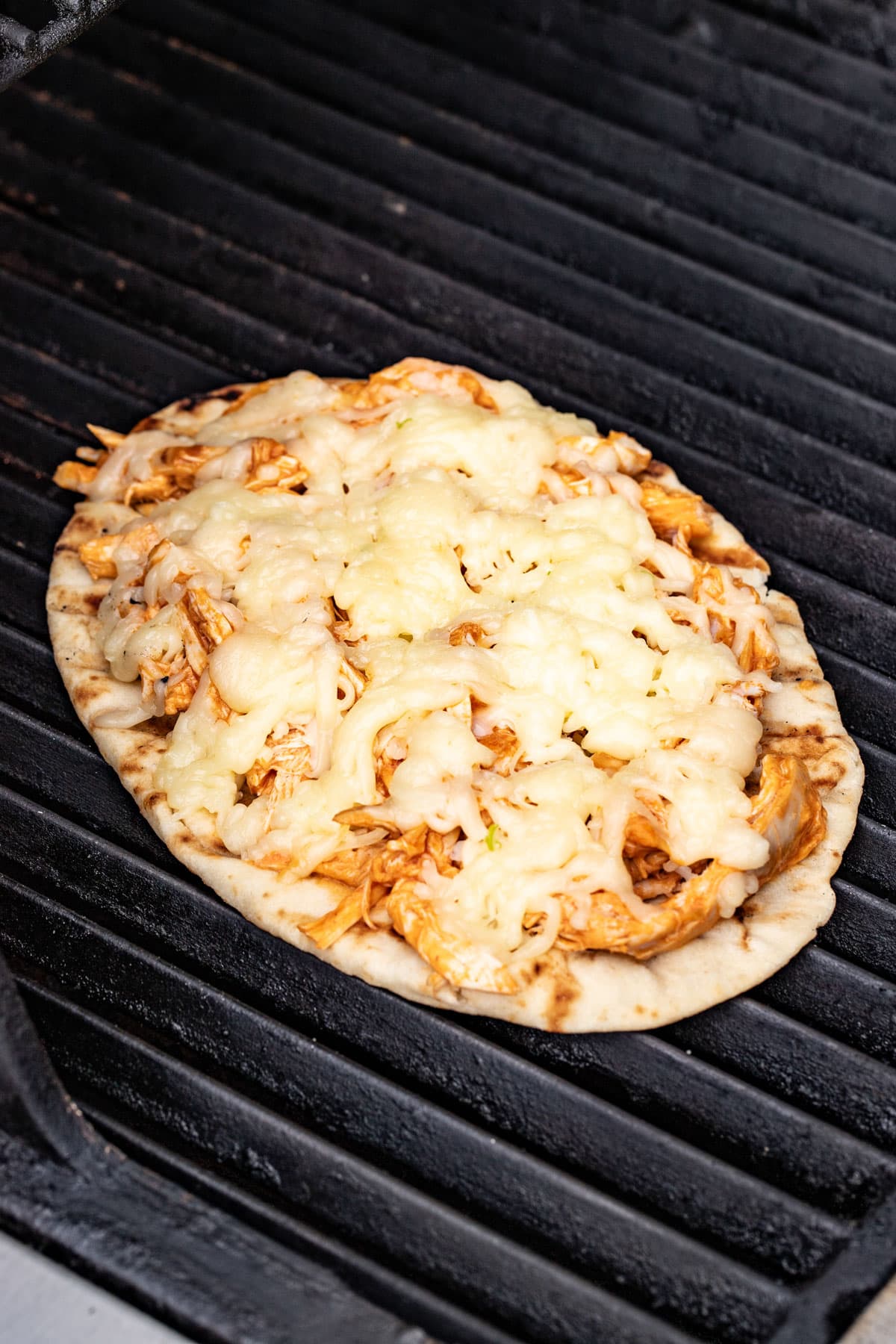 Grilled flatbread showing how it looks when done.