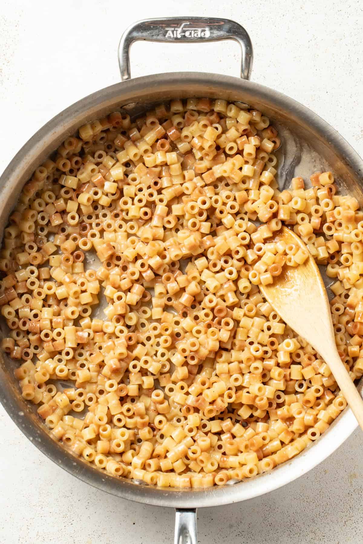 Toasted pasta after adding in the broth.