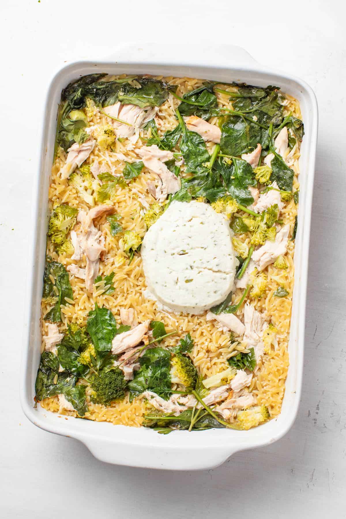 Boursin cheese melted into the orzo and broccoli after baking.