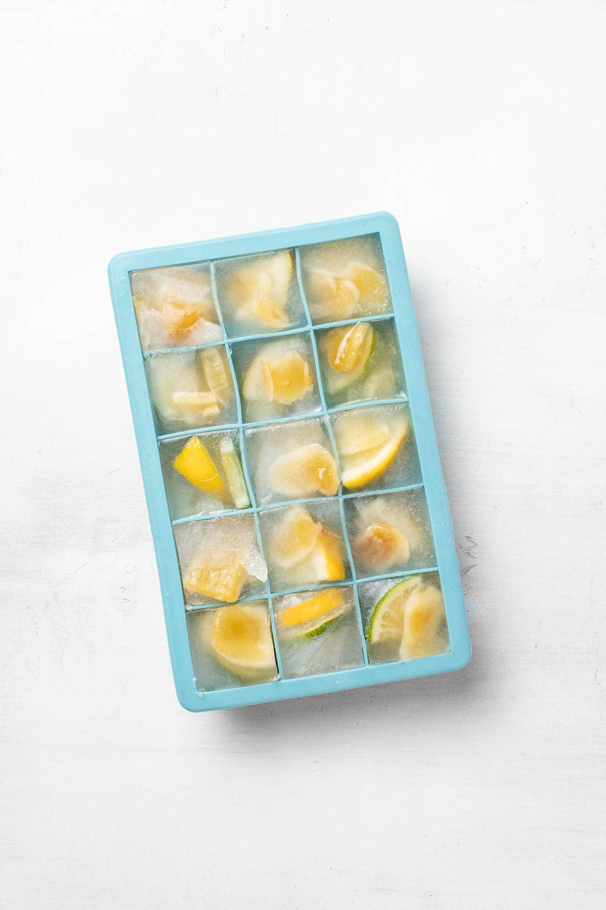 Fresh citrus ice cubes after being frozen.