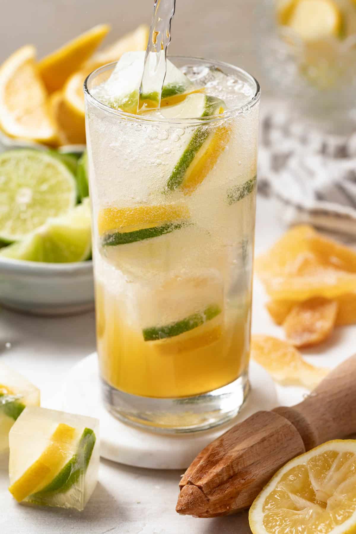 Homemade sprite topped off with sparkling water in a tall glass.