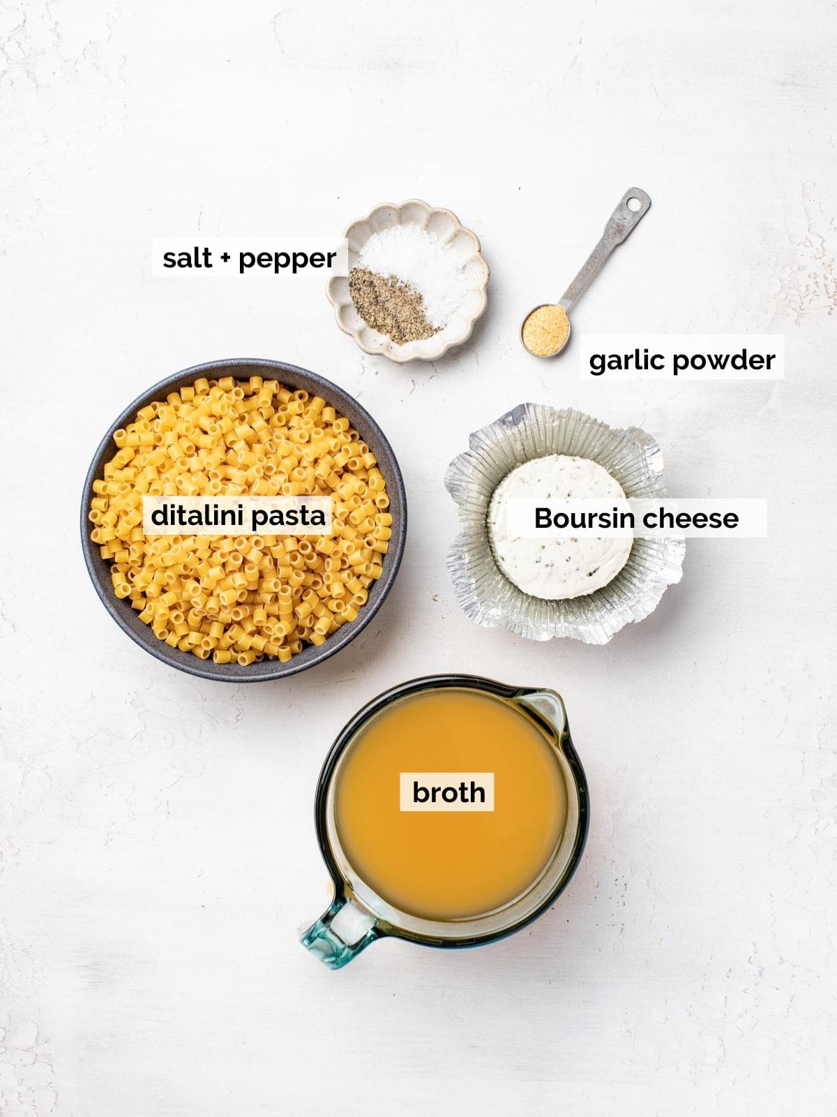 Ingredients for a ditalini pasta with Boursin cheese.