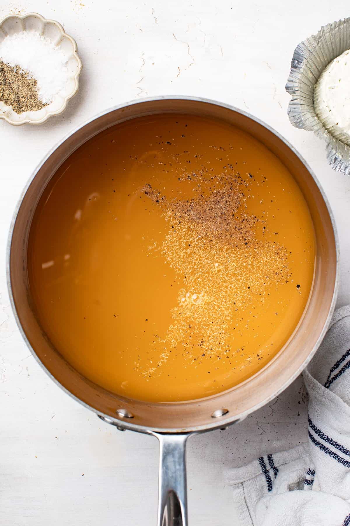 Broth in a saucepan.
