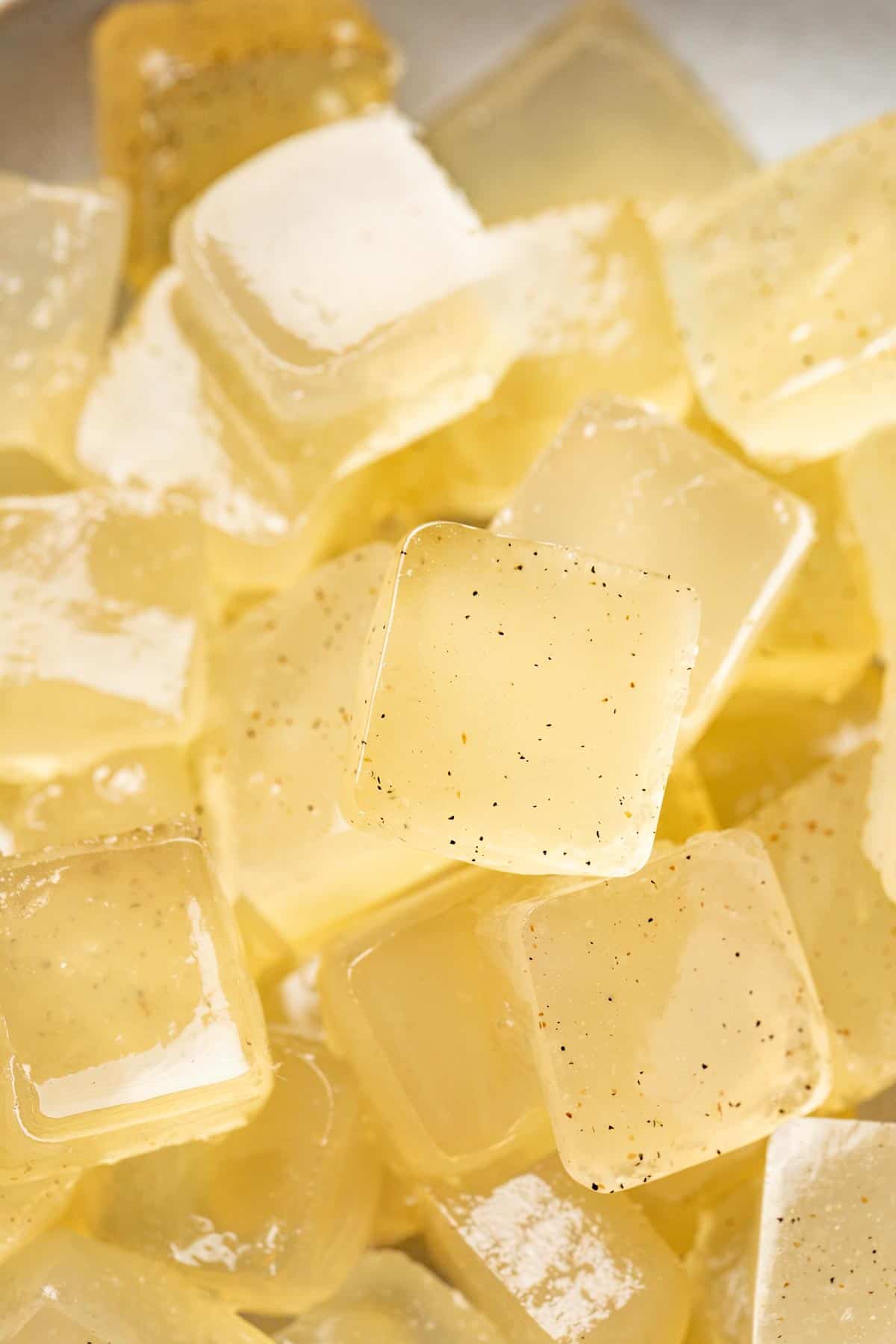 Pale yellow gummies in a bowl.