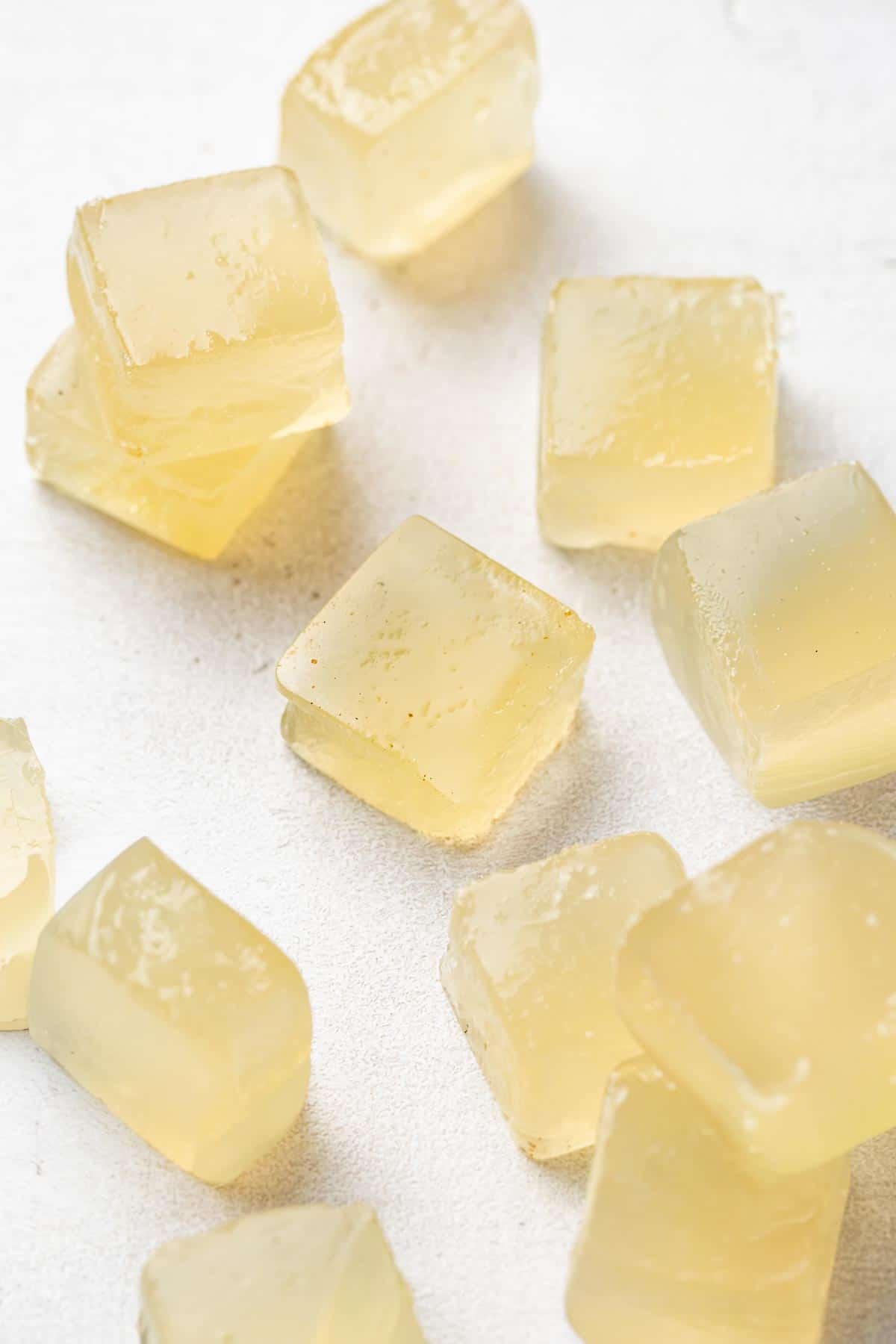 Freshly made gummies on a white background.