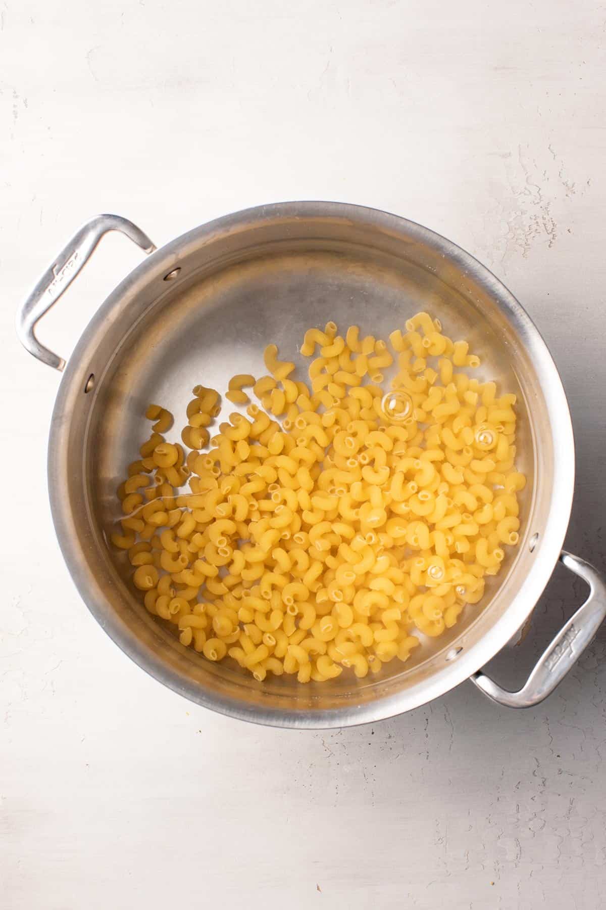 Boiling pasta in a large pot.
